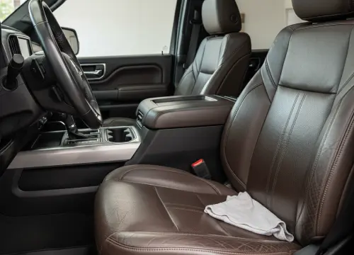 Leather seats being deep cleaned and conditioned.