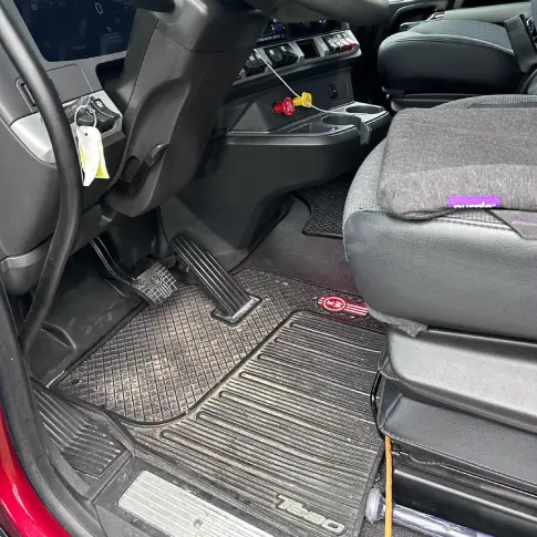 Work truck interior cluttered with tools and dirt before detailing in Mississauga.