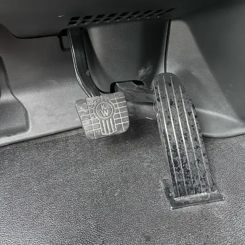 Truck floor mats caked with mud before cleaning in Mississauga.