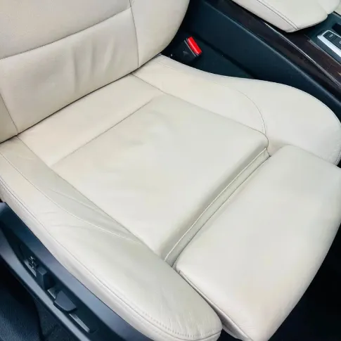 After: car seat cleaned and restored post mobile detailing