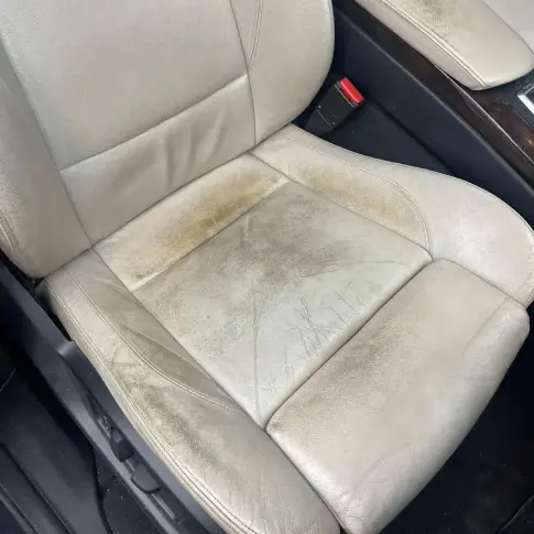 Before: heavily soiled car interior prior to mobile detailing