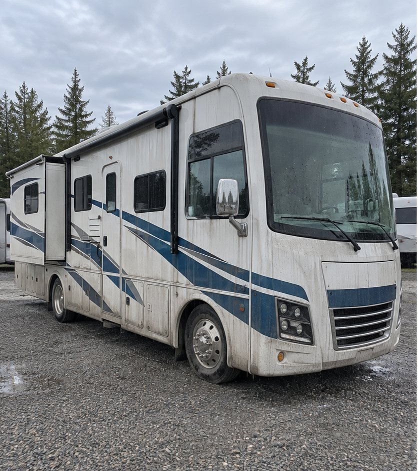 Class A motorhome exterior covered in dust and grime with a dull finish